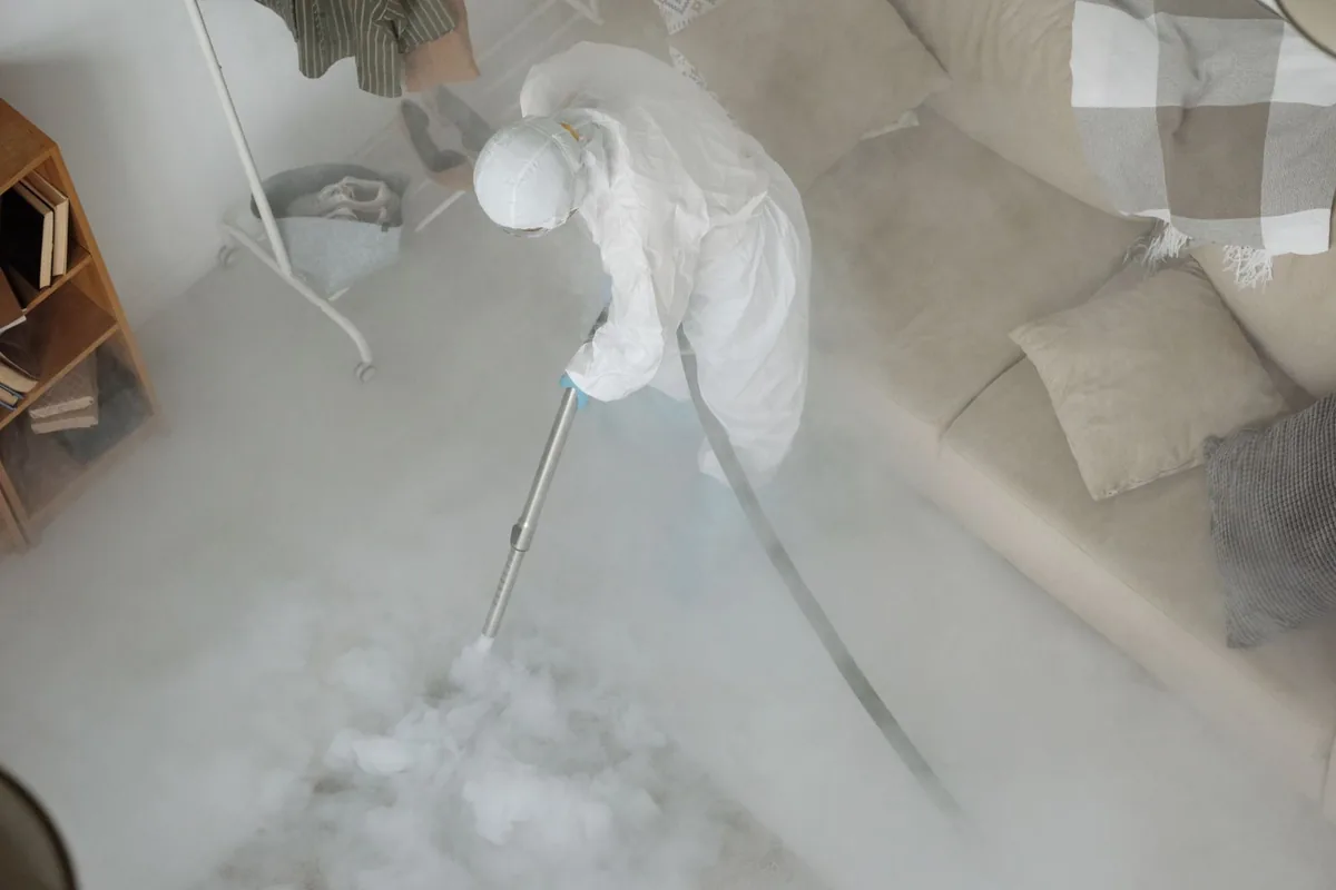 Biohazard cleanup technician in protective equipment, Veneta, OR